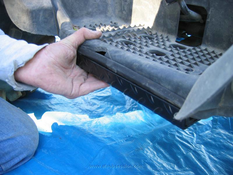 05. Step 3. The plate will settle into position.  You may have to ream one or both holes with a drill to ensure bolt can go straight down..jpg