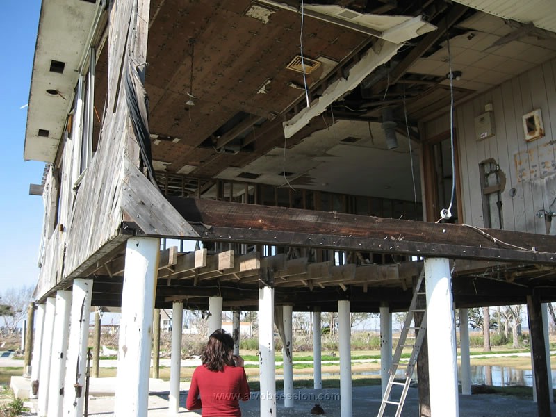 70. Lakeside, his house is smashed...and still one of the few standing..jpg