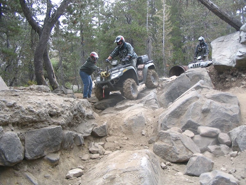 054. Derrick heads down the off-camber, while Larry helps out..jpg