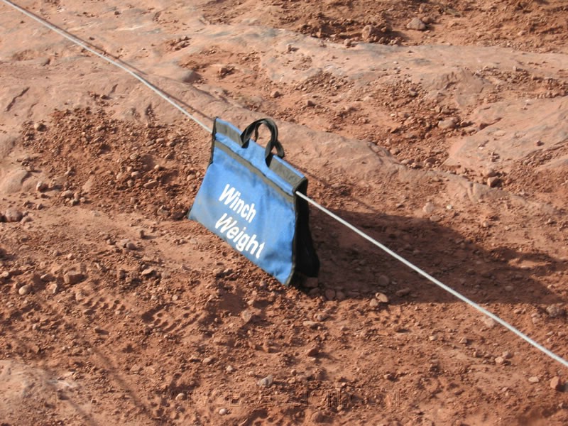 132. Jack attaches his winch weight to prevent flying cable..jpg