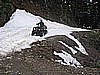 047. Terry over the first snow mound..jpg