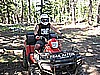 09. Jimmy tries my quad...and I ride the bike..jpg