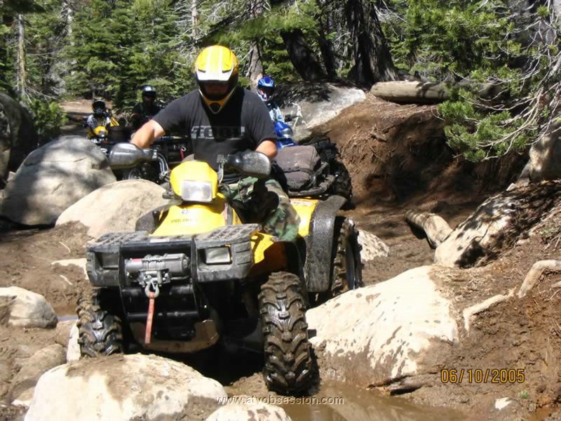 31. Larry working through the sloppy trail and boulders..jpg