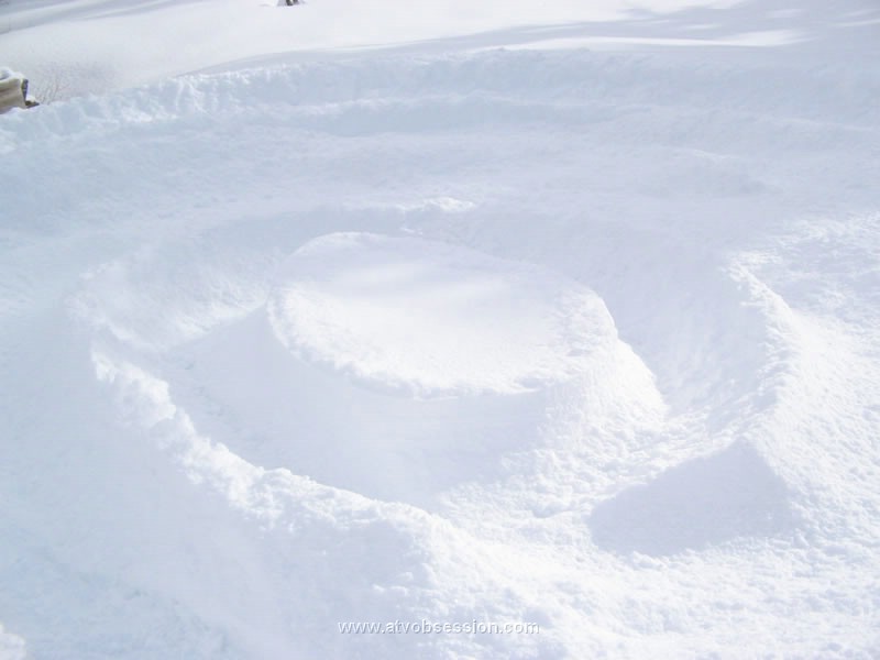 035. Larry made his own Butte in the snow making doughnuts..jpg