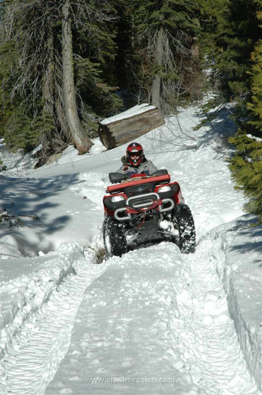 43. Just As We Cross a Small Stream We Meet Up With a Group Of Trucks..jpg